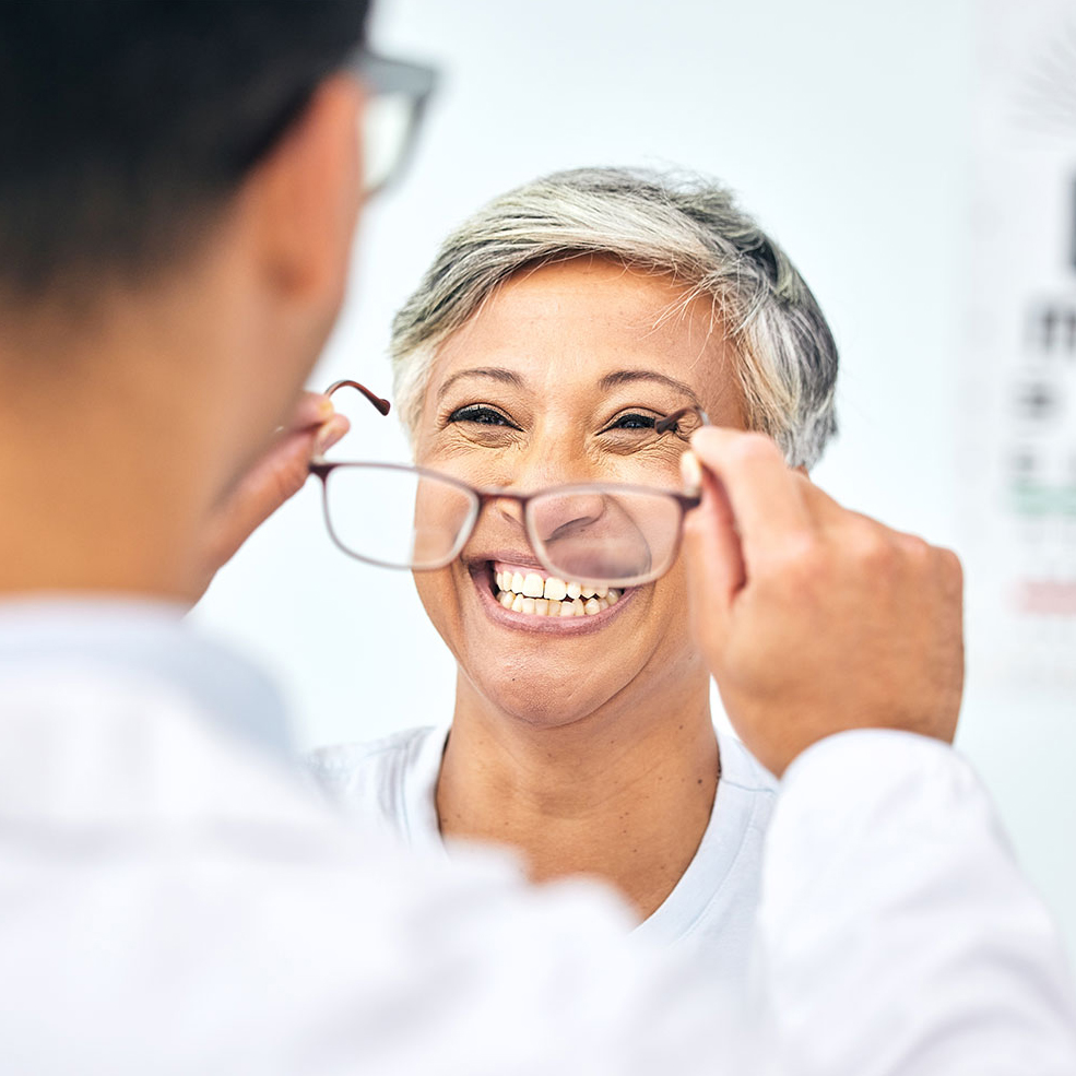 optometrist-with-patient optometrist with happy female patient